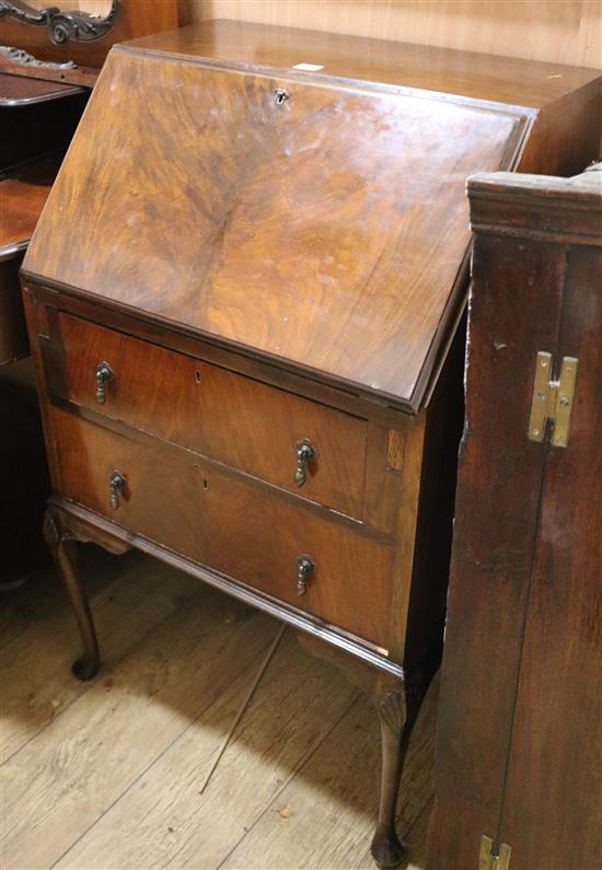 A 1930s walnut bureau W.54cm